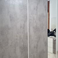 camera da letto grigia e bianca 