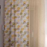 Tende a pannello giapponese con binario 