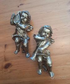 coppia di putti decorativi 