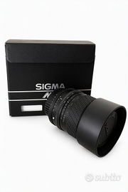 Sigma 28-70mm 1:3.5-4.5 Teleobiettivo + Flash Sunp