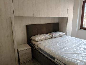 Camera a ponte matrimoniale 