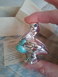 Cicogna laminata argento, Nuova