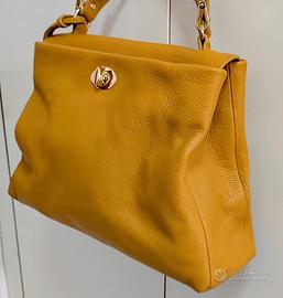 Borsa da donna Senape, vera pelle firmata Melluso.