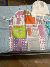 Grembiuli da bambini  18 rosa 13 blu pua e capelli