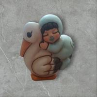 Bimbo Thun su cicogna 