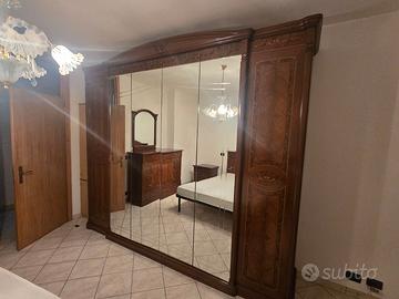 Camera da letto in legno massiccio