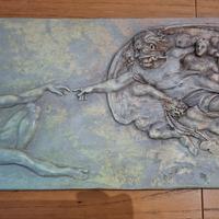 Scultura la creazione di Adamo