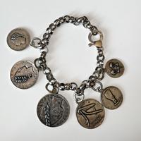 Bracciale Raspini con charm monete