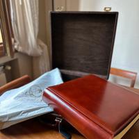 Album fotografico con valigia in pelle