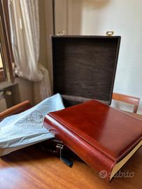 Album fotografico con valigia in pelle