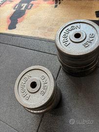 Attrezzi palestra dischi
