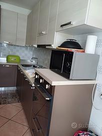 Cucina Spar con elettrodomestici Smeg