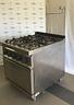 cucina-a-gas-con-4-fuochi-colonna-acqua-forno