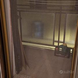 Zanzariera apertura laterale color bronzo