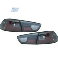 FANALI A LED MITSUBISHI LANCER 08- LED FONDO CROMA