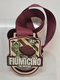Medaglia finisher Fiumicino Half Marathon 