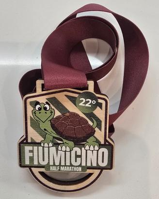 Medaglia finisher Fiumicino Half Marathon 
