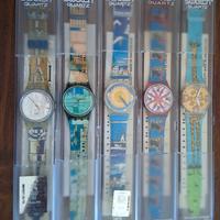 9 orologi swatch  4 uomo e 5 donna