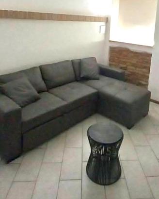 Divano letto angolare grigio