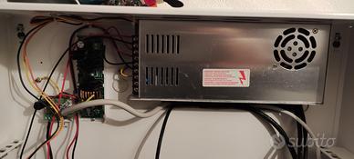 Alimentatore caricabatterie UPS videosorveglianza