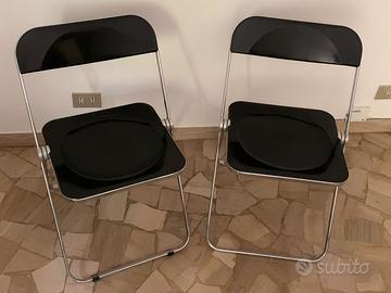 Due sedie Plia Castelli design G. Piretti nere