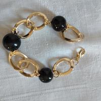 Bracciale nero e dorato 