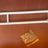 Maniglione ribaltabile disabili per il bagno