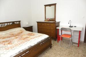 Ampia stanza singola in appartamento ristrutturato