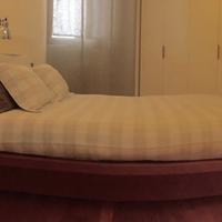 Letto con contenitore e retro letto per angolo