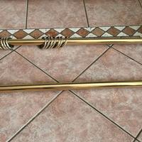 Supporto per tende dorato