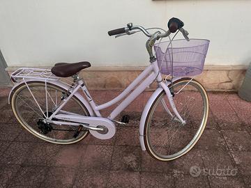 bicletta viola con cestito