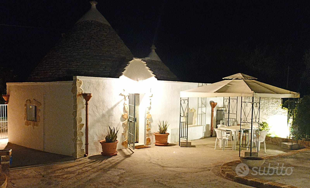 Trullo ristrutturato e terreno