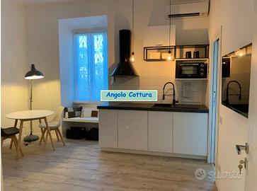 GARBATELLA MONOLOCALE ARREDATO Ben COLLEGATO