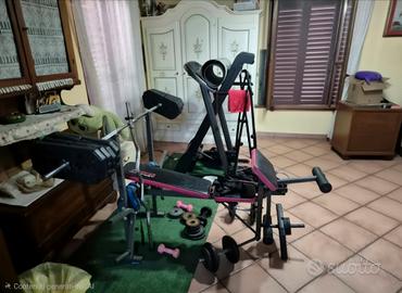 panca più manubri, bilancieri e pesi 