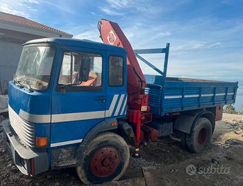 Camion 140 Gru, ribaltabile,M.operatrice PatenteB