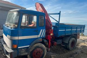 Camion 140 Gru, ribaltabile,M.operatrice PatenteB