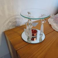 Candela elegante con angeli, soprammobile.