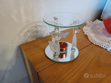 Candela elegante con angeli, soprammobile.