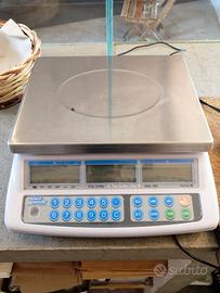 Bilancia esercizi commerciali con bollino 2024