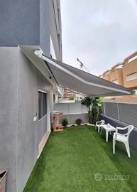 tenda a bracci motorizzata 