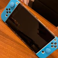 Nintendo switch oled bianco con gioco Mario kart