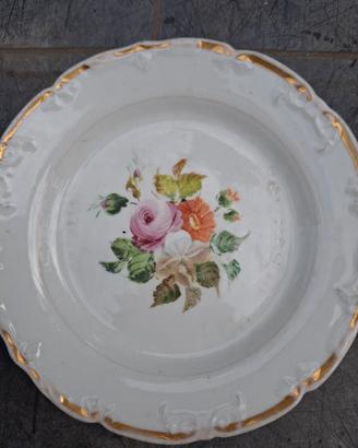 Coppia di antichi piatti in porcellana TPM