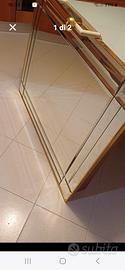 specchio con cornice bisellata