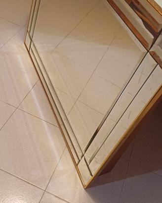 specchio con cornice bisellata