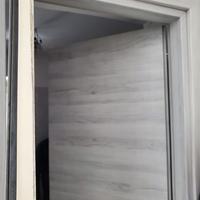 Porte interne moderne color rovere chiaro (grigio)