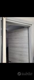 Porte interne moderne color rovere chiaro (grigio)