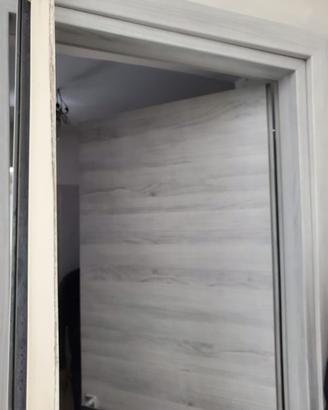 Porte interne moderne color rovere chiaro (grigio)