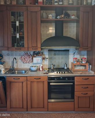 Cucina con elettrodomestici 