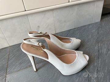 Guess decollete tacco e plateau