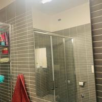 Specchio da bagno con luce applique